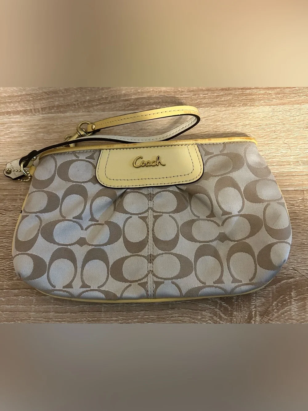 Coach Beige Signature Clutch with Yellow Trim